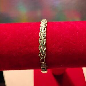 Silver bracelet braided